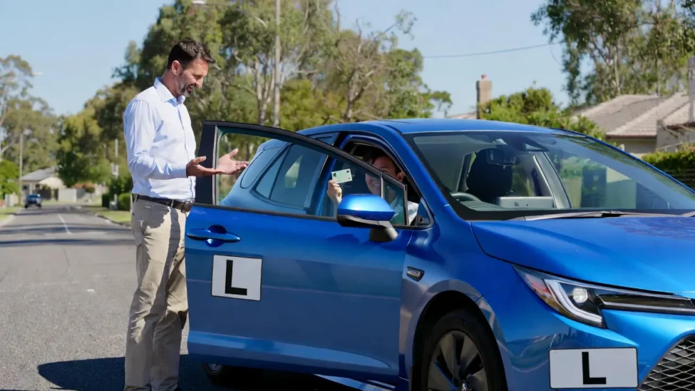 convert overseas licence to Victorian – driving lesson with instructor and international learner in Toyota Corolla Melbourne